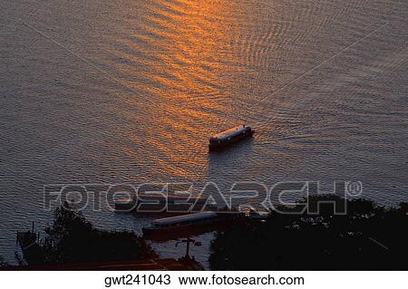 High angle view of tourboats in a lake, Janitzio Island, Lake Patzcuaro, Morelia, Michoacan State, Mexico View Large Photo Image Stock Image - High angle view of tourboats in a lake, Janitzio Island, Lake Patzcuaro, Morelia, Michoacan State, Mexico. Fotosearch