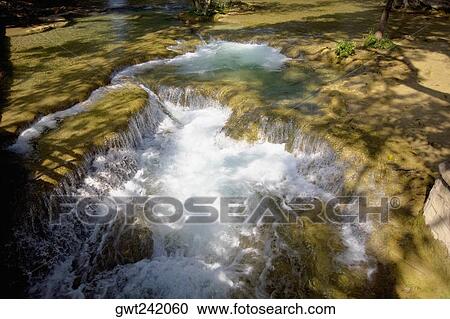 High angle view of a waterfall, Tamasopo Waterfalls, Tamasopo, San luis Potosi, Mexico View Large Photo Image Stock Image - High angle view of a waterfall, Tamasopo Waterfalls, Tamasopo, San luis Potosi, Mexico. Fotosearch