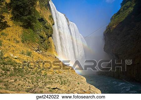 Low angle view of a waterfall, Tamul Waterfall, Aquismon, San Luis Potosi, Mexico View Large Photo Image Stock Image - Low angle view of a waterfall, Tamul Waterfall, Aquismon, San Luis Potosi, Mexico. Fotosearch