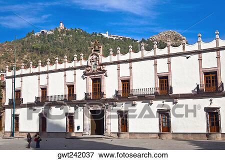 Two tourists standing in front of a palace, Government Palace, Zacatecas State, Mexico View Large Photo Image Stock Photo - Two tourists standing in front of a palace, Government Palace, Zacatecas State, Mexico. Fotosearch