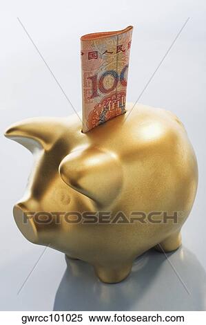 Chinese Yuan note in a piggy bank View Large Photo Image Stock Photography - Chinese Yuan note in a piggy bank. Fotosearch