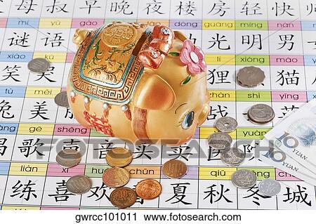 Close-up of a piggy bank with Chinese currency View Large Photo Image Stock Image - Close-up of a piggy bank with Chinese currency. Fotosearch