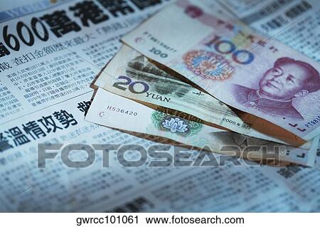 Close-up of Chinese currency on a newspaper View Large Photo Image Stock Image - Close-up of Chinese currency on a newspaper. Fotosearch