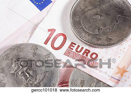 Close-up of coins and ten euro banknote View Large Photo Image Stock Photo - Close-up of coins and ten euro banknote. Fotosearch