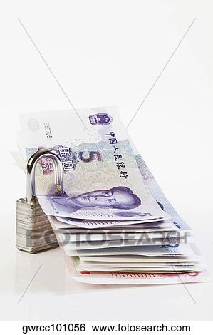 Lock with Chinese Yuan notes View Large Photo Image Stock Photograph - Lock with Chinese Yuan notes. Fotosearch