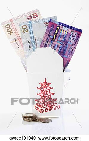 Paper currency in a donation box with coins View Large Photo Image Stock Image - Paper currency in a donation box with coins. Fotosearch