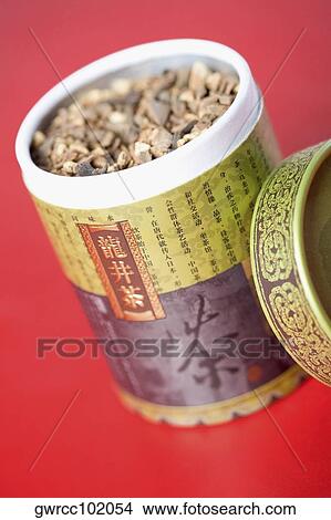 Chinese herbal tea in Chinese container View Large Photo Image Picture - Chinese herbal tea in Chinese container. Fotosearch