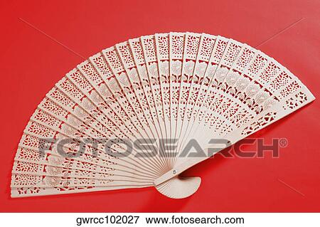 Close-up of a folding fan View Large Photo Image Stock Photo - Close-up of a folding fan. Fotosearch