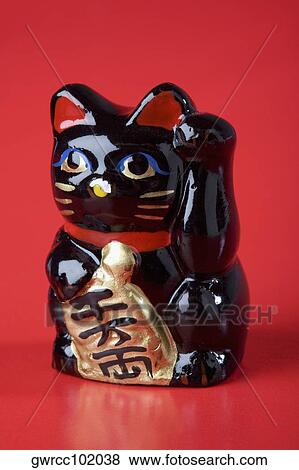 Close-up of a maneki neko View Large Photo Image Stock Photo - Close-up of a maneki neko. Fotosearch