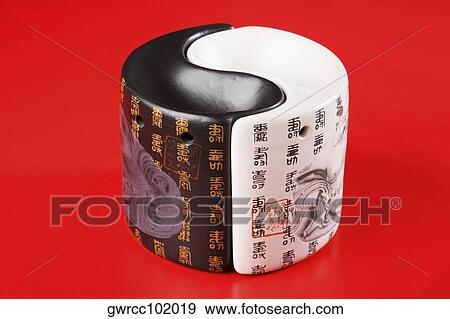 Close-up of a Ying Yang Chinese design ashtray View Large Photo Image Stock Photo - Close-up of a Ying Yang Chinese design ashtray. Fotosearch