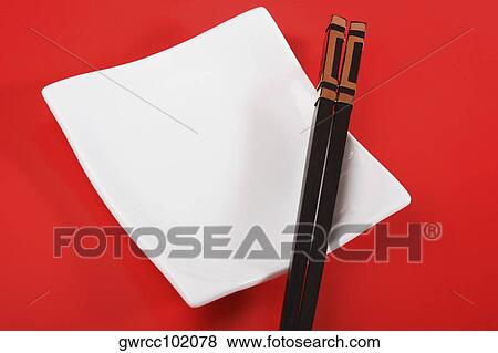 Close-up of chopsticks on a tray View Large Photo Image Stock Photo - Close-up of chopsticks on a tray. Fotosearch