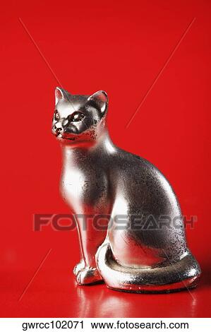 Close-up of figurine of a cat View Large Photo Image Stock Image - Close-up of figurine of a cat. Fotosearch