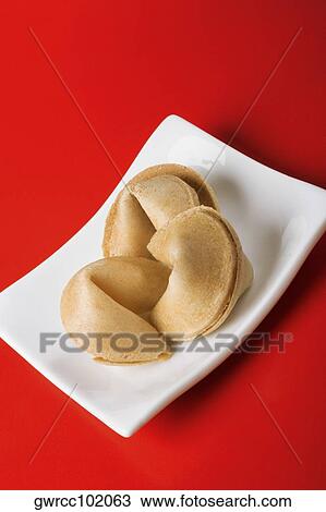 Close-up of fortune cookies in a tray View Large Photo Image Stock Image - Close-up of fortune cookies in a tray. Fotosearch