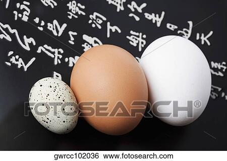 Close-up of three eggs in a plate View Large Photo Image Stock Photograph - Close-up of three eggs in a plate. Fotosearch