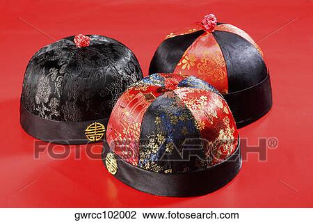 Close-up three Chinese traditional caps View Large Photo Image Stock Image - Close-up three Chinese traditional caps. Fotosearch