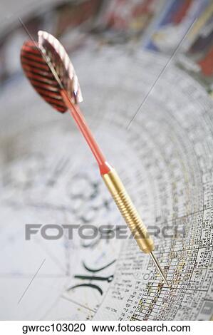 Close-up of a dart on a Chinese calendar View Large Photo Image Stock Image - Close-up of a dart on a Chinese calendar. Fotosearch