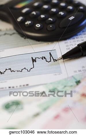 Close-up of a line graph on a financial report View Large Photo Image Stock Photograph - Close-up of a line graph on a financial report. Fotosearch