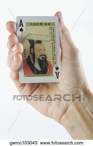 Close-up of a person's hand playing cards View Large Photo Image Stock Image - Close-up of a person's hand playing cards. Fotosearch