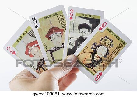 Close-up of a person's hands playing cards View Large Photo Image Stock Image - Close-up of a person's hands playing cards. Fotosearch