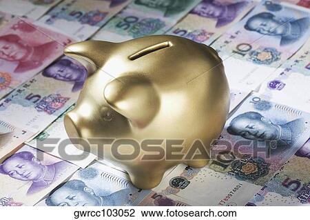Close-up of a piggy bank on paper currency View Large Photo Image Stock Image - Close-up of a piggy bank on paper currency. Fotosearch