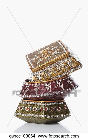 Close-up of a stack of jewelry boxes View Large Photo Image Picture - Close-up of a stack of jewelry boxes. Fotosearch