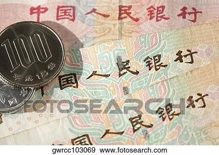 Close-up of Chinese coins and Chinese Yuan notes View Large Photo Image Stock Photo - Close-up of Chinese coins and Chinese Yuan notes. Fotosearch