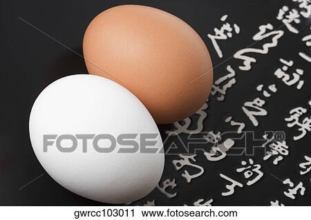 Close-up of two eggs in a plate View Large Photo Image Stock Image - Close-up of two eggs in a plate. Fotosearch
