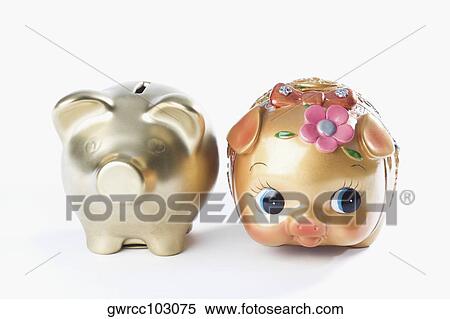 Close-up of two piggy banks View Large Photo Image Stock Photography - Close-up of two piggy banks. Fotosearch