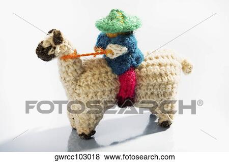Figurine of a man horseback riding View Large Photo Image Stock Photo - Figurine of a man horseback riding. Fotosearch