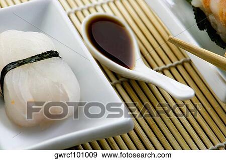 Close-up of a sushi served in a tray View Large Photo Image Stock Photo - Close-up of a sushi served in a tray. Fotosearch