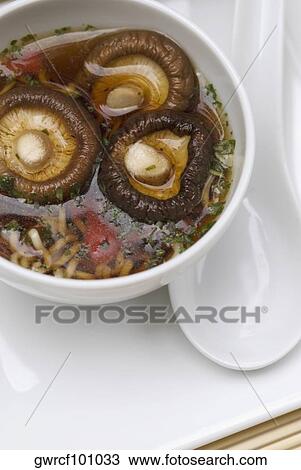 Close-up of Chinese soup with mushrooms in a bowl View Large Photo Image Stock Image - Close-up of Chinese soup with mushrooms in a bowl. Fotosearch