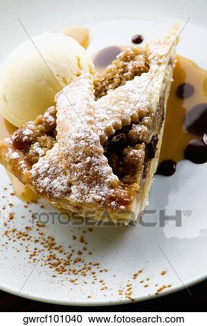 Close-up of ice-cream with tart served in a plate View Large Photo Image Stock Image - Close-up of ice-cream with tart served in a plate. Fotosearch