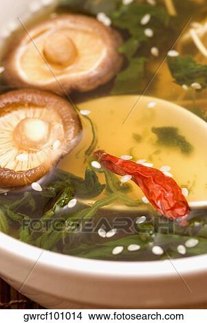 Close-up of red chili pepper with hon-shimeji mushrooms in a bowl View Large Photo Image Picture - Close-up of red chili pepper with hon-shimeji mushrooms in a bowl. Fotosearch