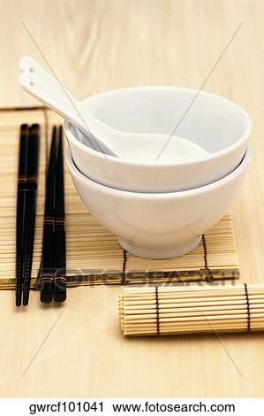 Close-up of soup spoons with bowls and chopsticks View Large Photo Image Stock Image - Close-up of soup spoons with bowls and chopsticks. Fotosearch