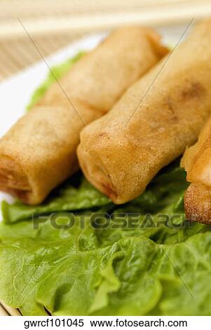 Close-up of spring rolls View Large Photo Image Stock Photography - Close-up of spring rolls. Fotosearch