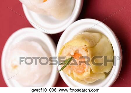 Close-up of sushi rolls served in bowls View Large Photo Image Stock Photograph - Close-up of sushi rolls served in bowls. Fotosearch