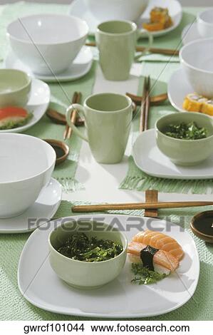Close-up of wakame salads with sushi in plates View Large Photo Image Picture - Close-up of wakame salads with sushi in plates. Fotosearch