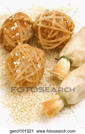 Shrimp balls wrapped in rice noodles and served with sushi View Large Photo Image Stock Image - Shrimp balls wrapped in rice noodles and served with sushi. Fotosearch
