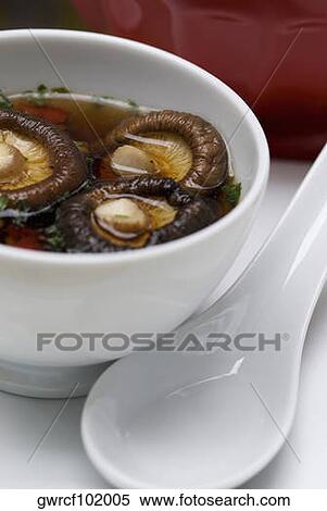 Close-up of Chinese soup with mushrooms in a bowl View Large Photo Image Stock Photography - Close-up of Chinese soup with mushrooms in a bowl. Fotosearch