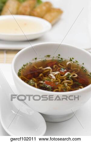 Stock Image - Close-up of noodles in a bowl. Fotosearch