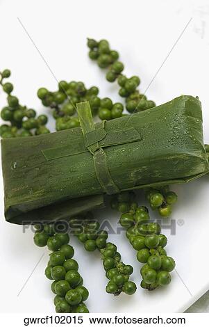 Close-up of rice dumpling on Chinese green pepper View Large Photo Image Stock Photography - Close-up of rice dumpling on Chinese green pepper. Fotosearch
