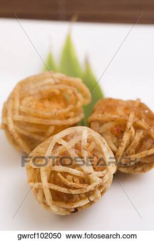 Close-up of shrimp balls wrapped in rice noodles View Large Photo Image Stock Image - Close-up of shrimp balls wrapped in rice noodles. Fotosearch