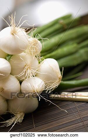 Close-up of spring onions View Large Photo Image Stock Photography - Close-up of spring onions. Fotosearch
