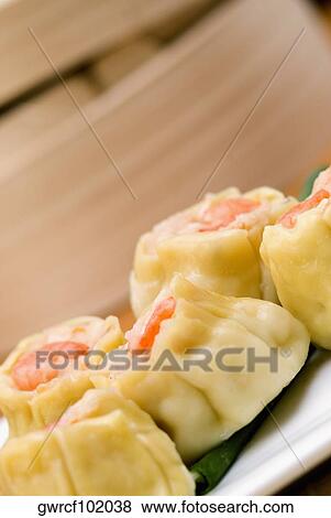 Close-up of sushi rolls served in a tray View Large Photo Image Stock Photo - Close-up of sushi rolls served in a tray. Fotosearch