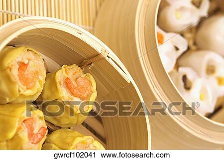 Close-up of sushi rolls served in wicker plates View Large Photo Image Stock Image - Close-up of sushi rolls served in wicker plates. Fotosearch