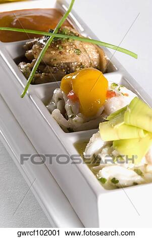 Stock Image - Seafood served in a tray. Fotosearch