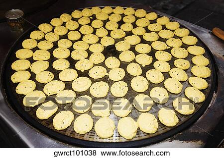 Stock Photo - Chinese food on a large pan, Qingdao, Shandong Province, China. Fotosearch