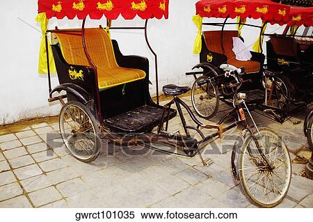 Pedicabs in front of a wall, Qufu, Shandong Province, China View Large Photo Image Stock Photography - Pedicabs in front of a wall, Qufu, Shandong Province, China. Fotosearch