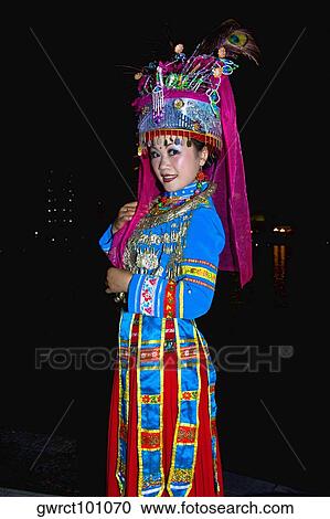 Portrait of a young woman smiling, Guilin, Guangxi Province, China View Large Photo Image Stock Image - Portrait of a young woman smiling, Guilin, Guangxi Province, China. Fotosearch