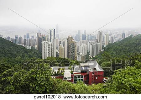 Aerial view of skyscrapers in a city, Hong Kong Island, Hong Kong, China View Large Photo Image Stock Photo - Aerial view of skyscrapers in a city, Hong Kong Island, Hong Kong, China. Fotosearch